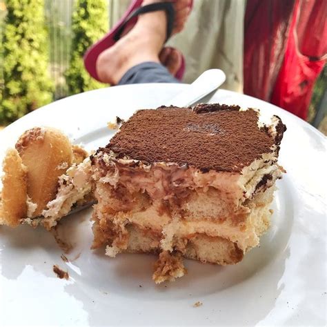 A Piece Of Cake Sitting On Top Of A White Plate