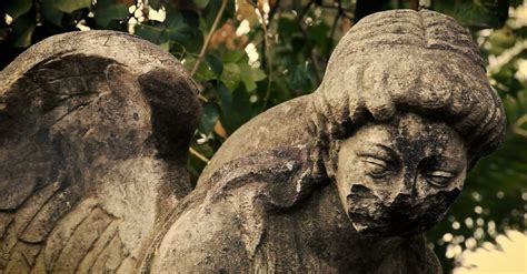 Close-up of old broken angel statue Free Stock Video Footage, Royalty-Free 4K & HD Video Clip