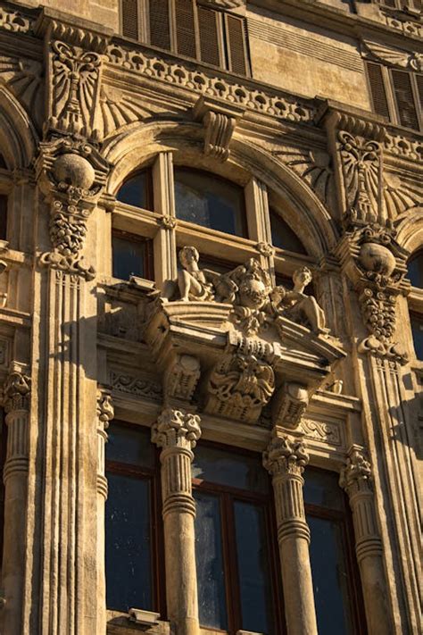 Sculptures On A Building · Free Stock Photo
