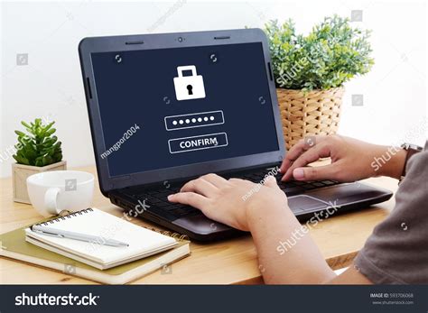 man typing password  labtop screen stock photo  shutterstock