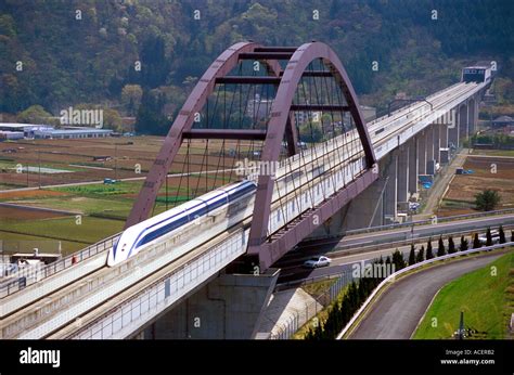 Prototype Maglev Train Zooming Along A Test Track In Yamanashi