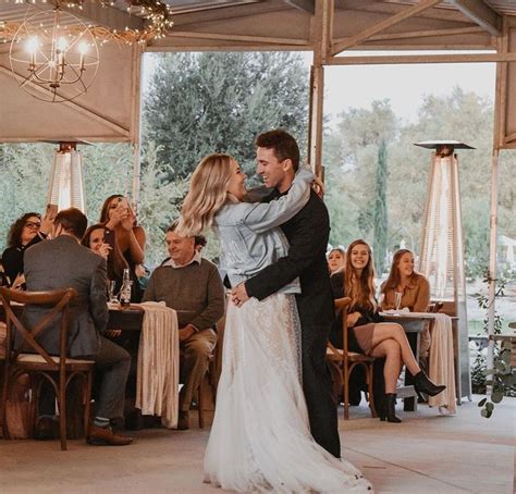 A Bride And Groom Sharing Their First Dance