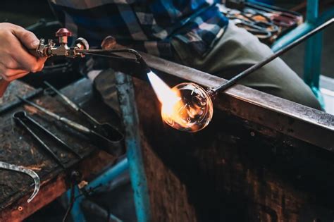 Premium Photo Manual Worker Making Glass At Workshop