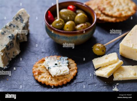 Olives Cheese And Biscuits Stock Photo Alamy