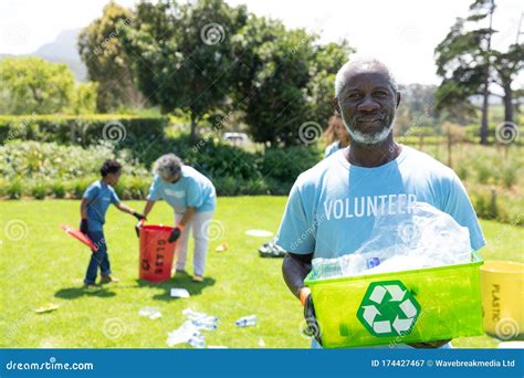 Volunteers Collecting Rubbish And Recycling Stock Image Image Of