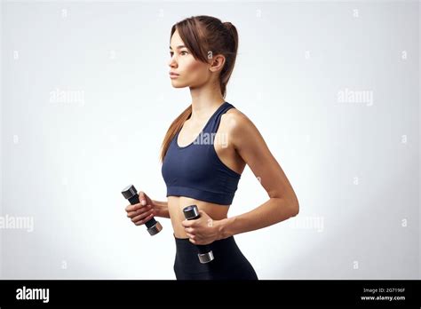 Pretty Brunette Slim Figure Strength Exercises Dumbbells Fitness Stock