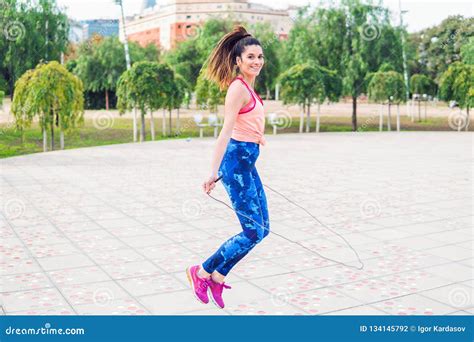 Fit Beautiful Woman With Jumping Rope In A Park Stock Photo Image Of