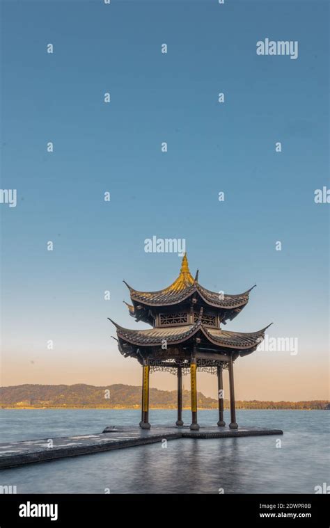 Sunrise View Of Jixian Pavilion The Historic Landmark In At West Lake