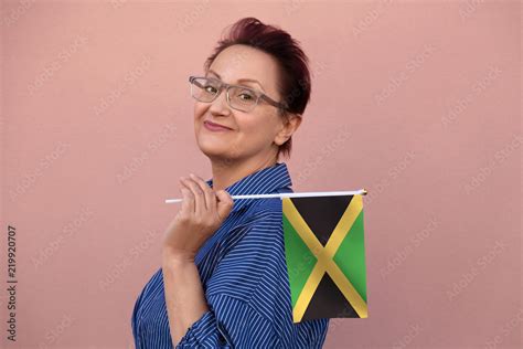 Jamaica Flag Woman Holding Jamaican Flag Nice Portrait Of Middle Aged