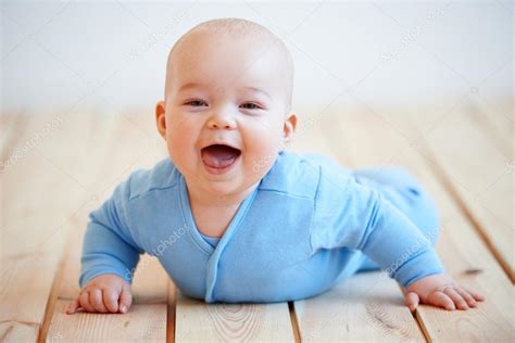 Cute Happy Baby Boy Crawling On The Floor — Stock Photo © Dashek 55260497