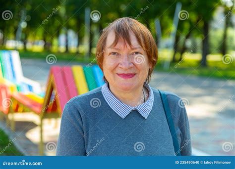 Smiling Mature Lady In Urban Park Stock Photo Image Of Casual 6065