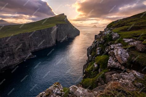 Premium Photo Sunrise At Sorvagsvatn Or Leitisvatn Lake In The Island