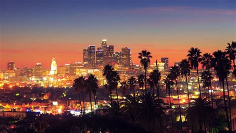 Scenic View Of Downtown Los Angeles With Palm Trees In Foreground 4k