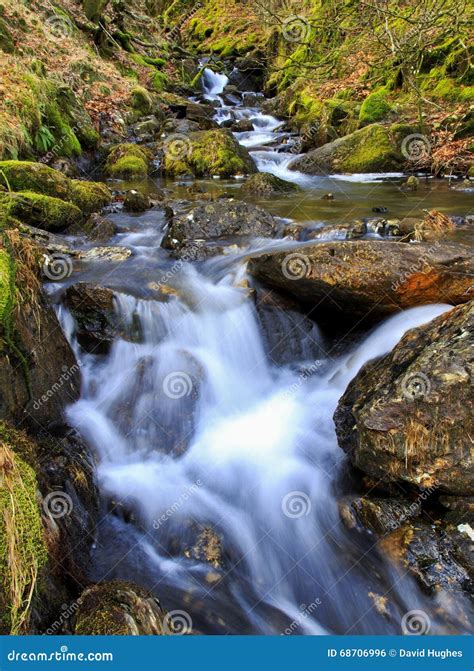 Cascading Waterfalls By The Watkins Path Flowing Into The Afon Cwm Llan