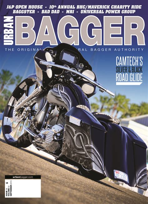 A Magazine Cover With A Blue Motorcycle On Its Front Wheel And The