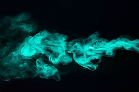 Beauty Turquoise Smoke On Black Background Free Photo