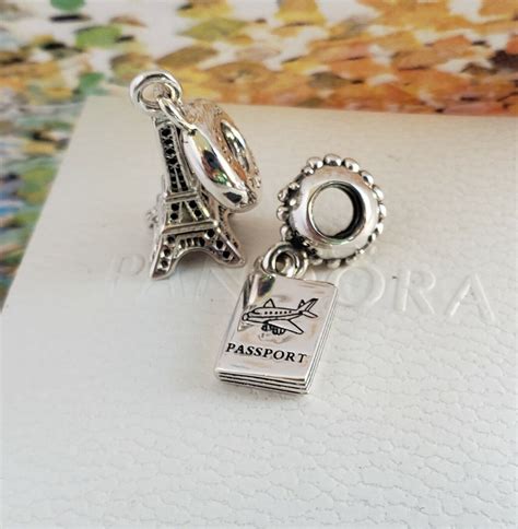 Set Of 2 Authentic Pandora Eiffel Tower Dangle Charm And Passport Charm