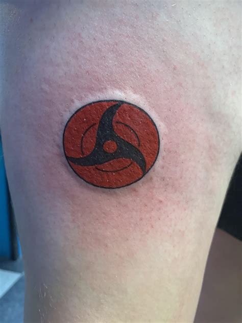 First tattoo. Had to get it. Itachi Mangekyō Sharigan. Got it on my ...