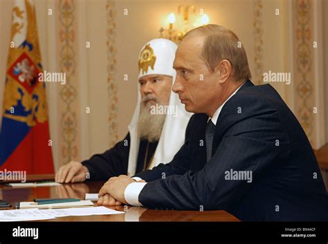 President Vladimir Putin And Patriarch Alexy Ii Of Moscow And All