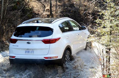 kia sportage  drive car reviews auto