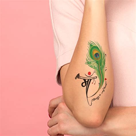 Share More Than 70 Peacock Feather Tattoo On Wrist Latest In Cdgdbentre