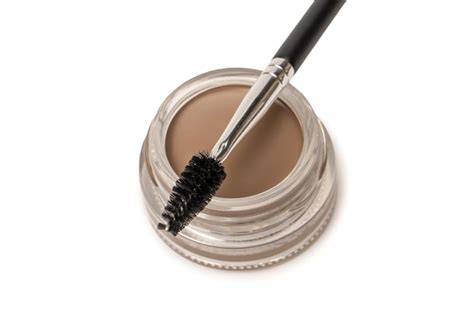 Premium Photo A Brow Pomade In Blonde Shade With Brush Isolated On A
