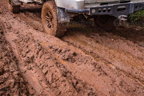 Tire tracks on a muddy road. 9756983 Stock Photo at Vecteezy