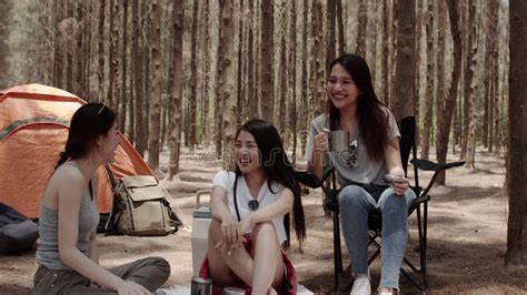 Lgbt Lesbian Women Couple Camping Or Picnic Together In Forest