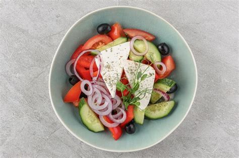 Premium Photo Greek Salad On A Stone Background Studio Shooting