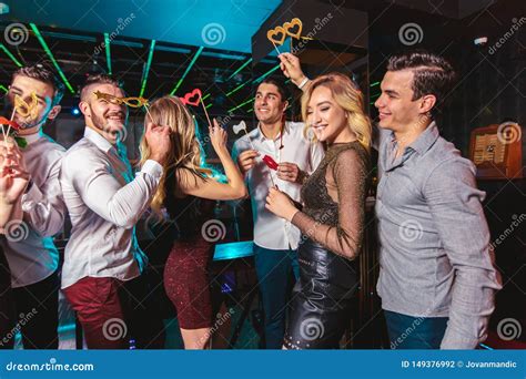 Happy People Are Dancing In Club Nightlife And Disco Concept Stock