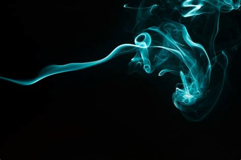 Free Photo Soft Turquoise Smoke Design On Black Background