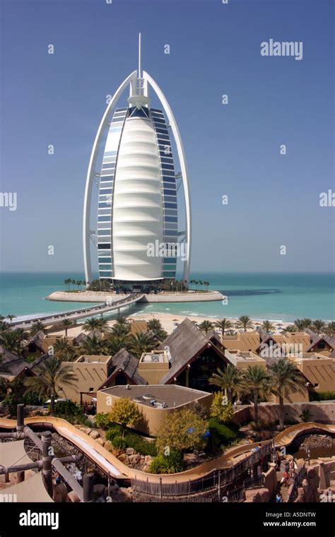 Burj Al Arab Hotel With Wild Wadi Water Park In The Foreground Dubai