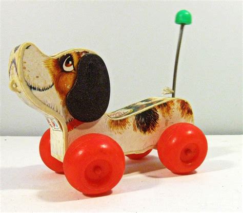 Wooden Toy Dog On Wheels : nostalgia