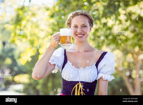 Pretty Oktoberfest Blonde Toasting In The Park Stock Photo Alamy