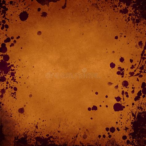 Orange Grunge Background With Splatters In The Borders Stock Photo