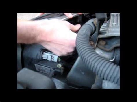 How To Change The Headlight Bulbs On A Peugeot Shown On A Peugeot