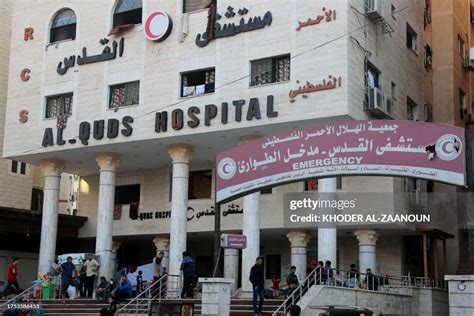 People Wait Outside Gaza Citys Al Quds Hospital On October 29 As