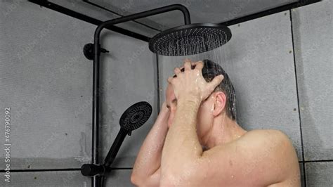 Strong Man Takes Shower After Waking Up In Morning Washing Hair Under