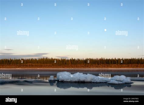An Ice Floe Lies On The Vilyui River In Yakutia Against The Backdrop Of