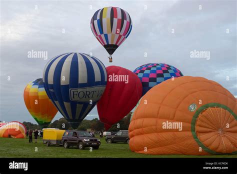 Hot Air Balloons Being Inflated And Taking Off From The Knavesmire York United Kingdom Stock