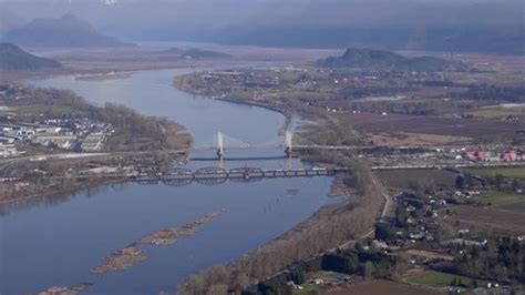 Aerial View Of Pitt River Bridge And Canadian Pacific Railway Spanning Between Port Coquitlam