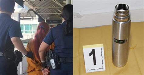 WOMAN WHO SPLASHED HUSBAND WITH HOT WATER TRIED TO FLEE S PORE JAILED