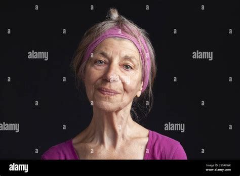 Happy Smiling Mature Woman In Her Seventy Five Years Old Lady With Trendy White Short Hair Stock