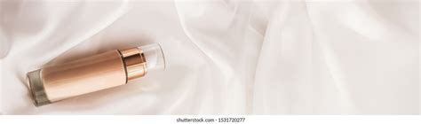 Tonal Bb Cream Bottle Makeup Fluid Foundation Base For Nude Skin Color On Silk Background