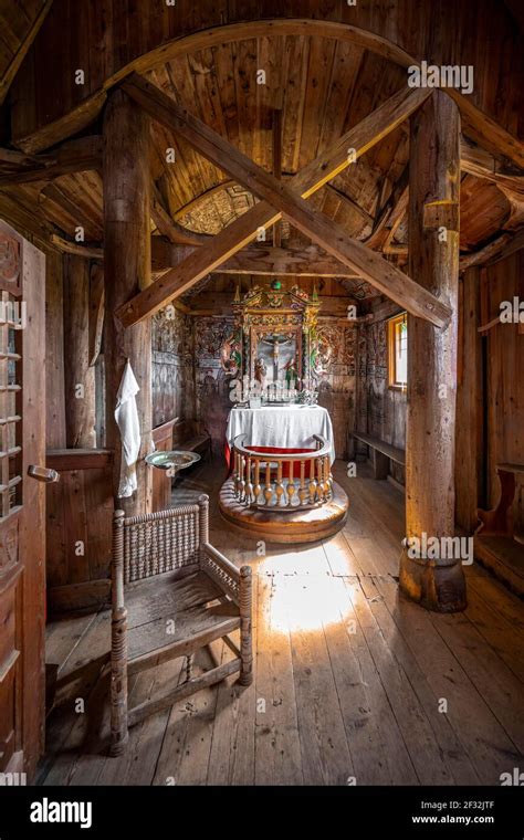 Interior and altar of the Urnes Stave Church, Romanesque church from ca ...