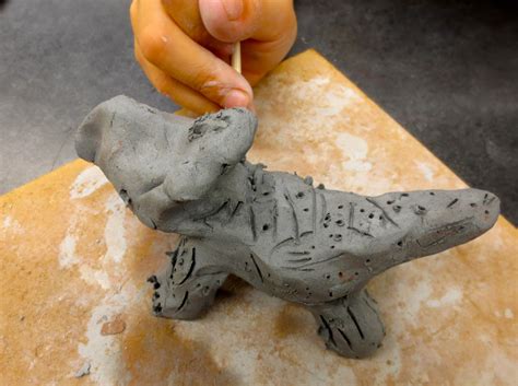 Zilker Elementary Art Class 1st Grade Clay Dinosaur Sculptures