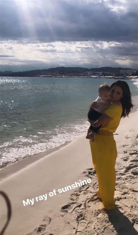 Eva Longoria and Son Smile on the Beach for Photo Shoot at Cannes