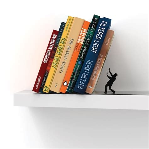 Metal Bookend // Shaped as Falling Books // Bookends // Metal - Etsy