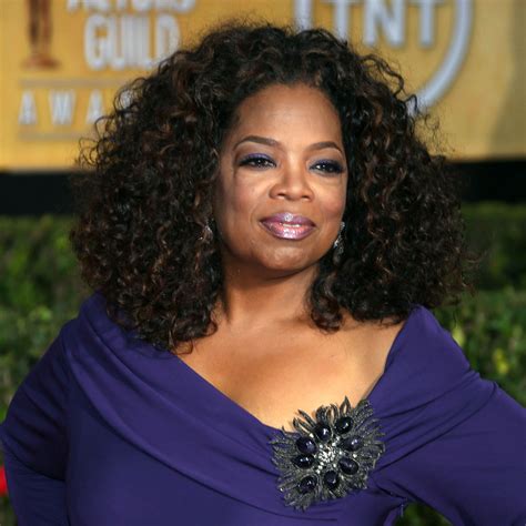 Were Still Not Over These Purple Looks From Oprah Winfrey While