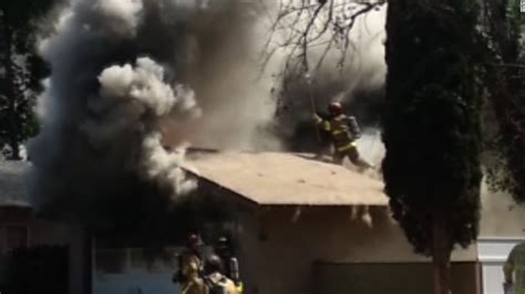 Firefighter Falls Through Burning Roof Cnn Video